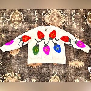 Queen of sparkles size small Christmas lights sweatshirt